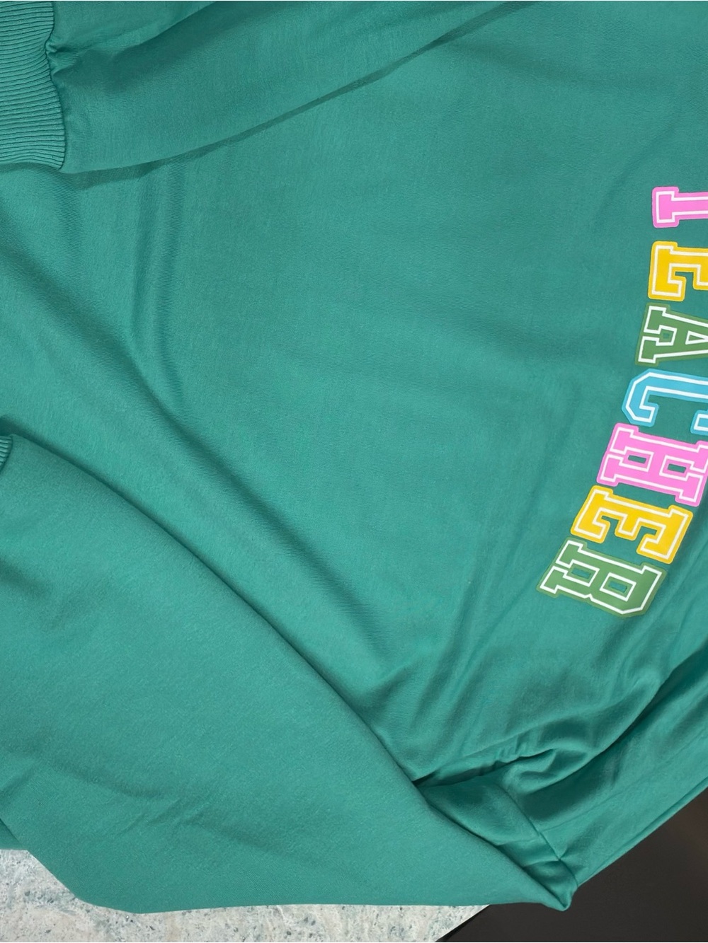 Women’s Teal 'Teacher' Graphic sweatshirt new never worn